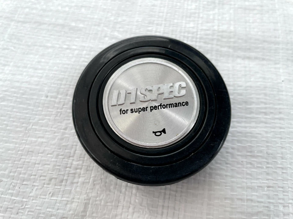 Botón de bocina del volante D1 SPEC Foto 2 de 3