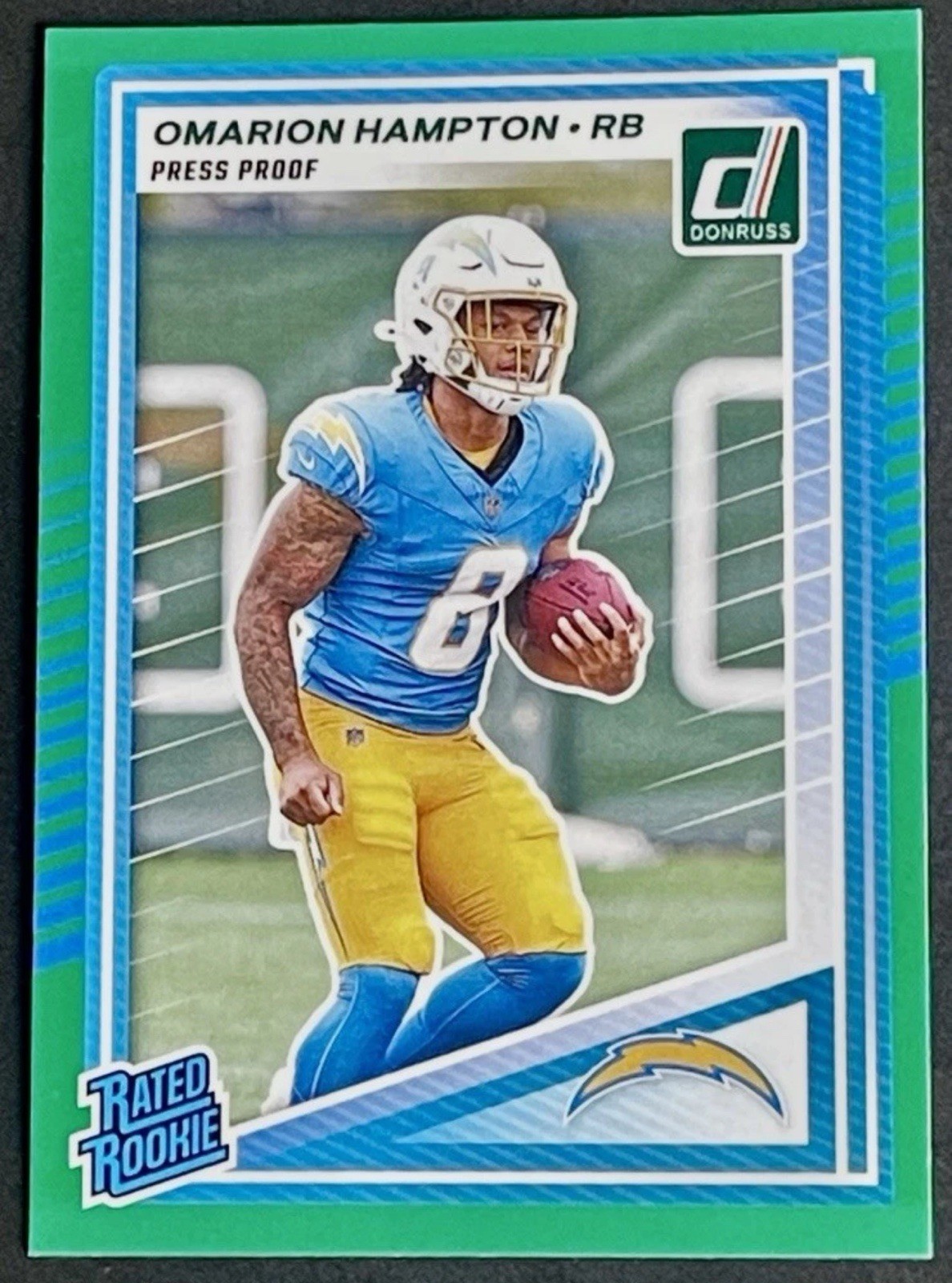 2025 Donruss Omarion Hampton Green Press Proof SP Rated Rookie Card 303 RC