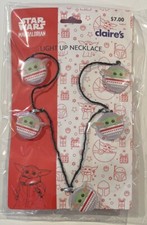 Claire  s Star Wars The Mandalorion Light Up The Child Grogu Necklace