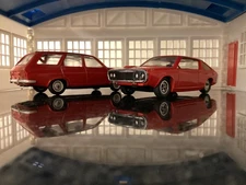 A Pair of Solido 1/43 Red Renaults: R 12 Break & R 17 Coupe