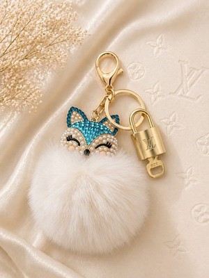 Authentic Louis Vuitton Lock and Key w/ Unbranded Faux Fur Blue Fox Bag Charm
