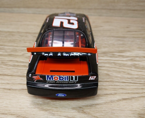 Team Caliber #12 Jeremy Mayfield Mobil 1 25th Anniversary Ford Taurus Bank 1:24 - Picture 7 of 9