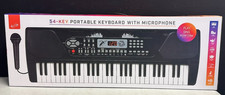 54 Key Portable Keyboard with Built In Speakers and Microphone