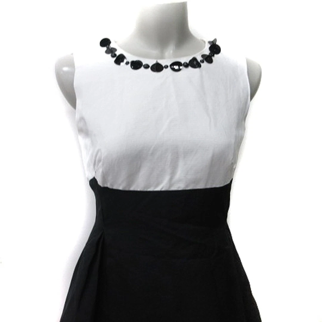 Paillettes senza maniche Kate Spade pezzo unico lunghezza ginocchio 2 M bianco nero YI (taglia usata