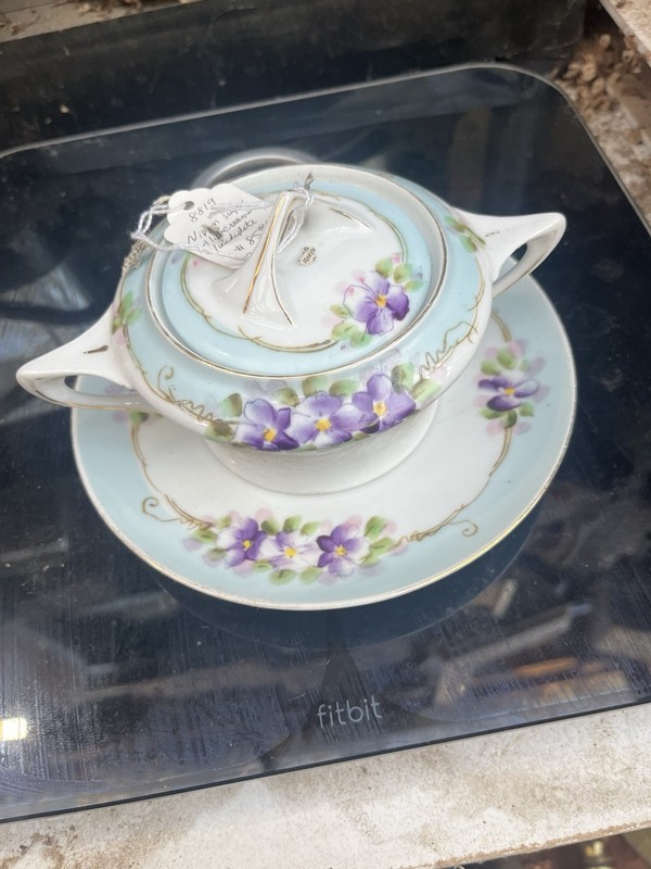 porcelain marked with a "Hand Painted Nippon" backstamp