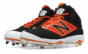 new balance youth cleats 4040v3 in black and orange