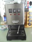 Gaggia Classic Pro Espresso Machine with two portafilter baskets and accesories