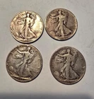 walking liberty half dollar. three 1945 coins, one 1946..