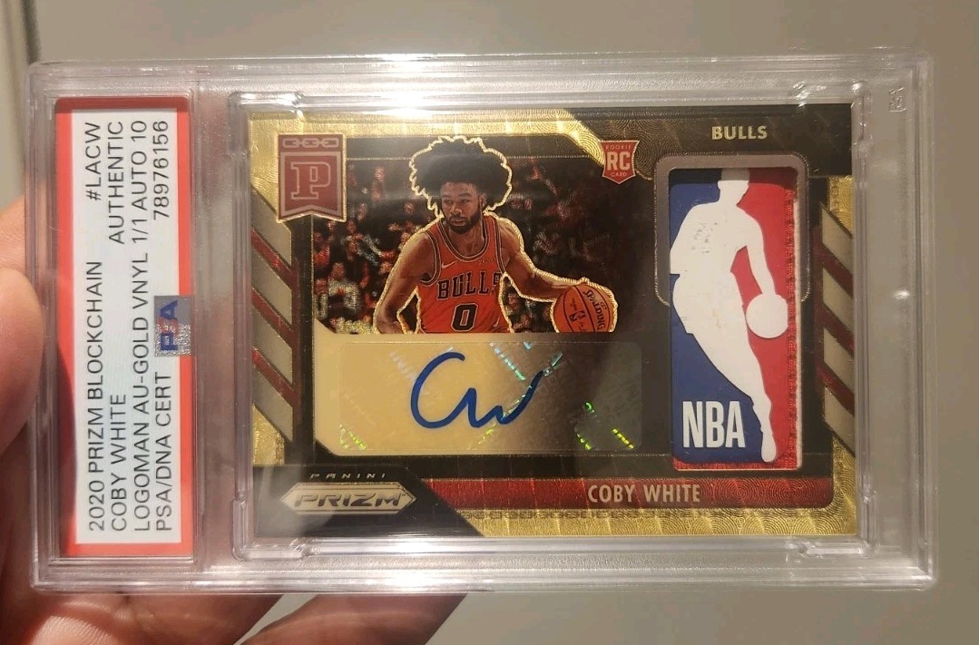 Coby White 2020 Prizm Blockchain Logoman Rookie Card Auto PSA 1/1 Gold Vinyl view 1