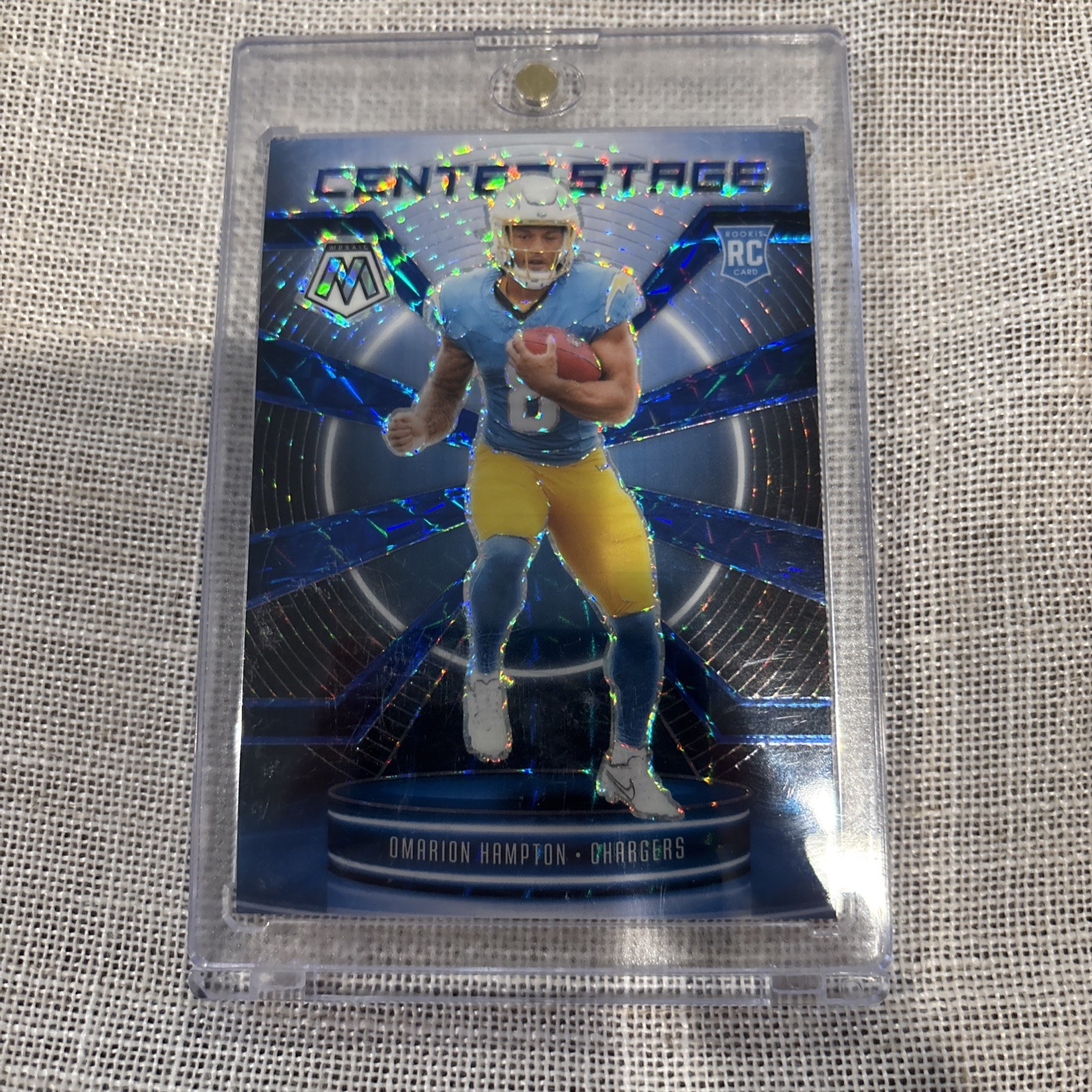 2025 Panini Mosaic - Center Stage Mosaic Omarion Hampton #6 Blue Prizm /99 (RC)