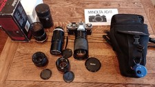 Minolta XD-7 35mm SLR camera, collection of lenses, bag, accessories