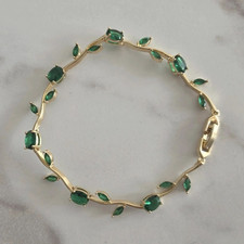 Goldfarbenes Gliederarmband Kette, 11 grüne ...