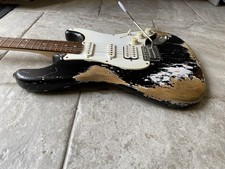 Stratocaster Black Nitro Heavy Relic Guitar-Squier By Fender