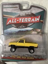 1987 GMC High Sierra Square Body Yellow Black Greenlight ALL Terrain 1/64 MIP