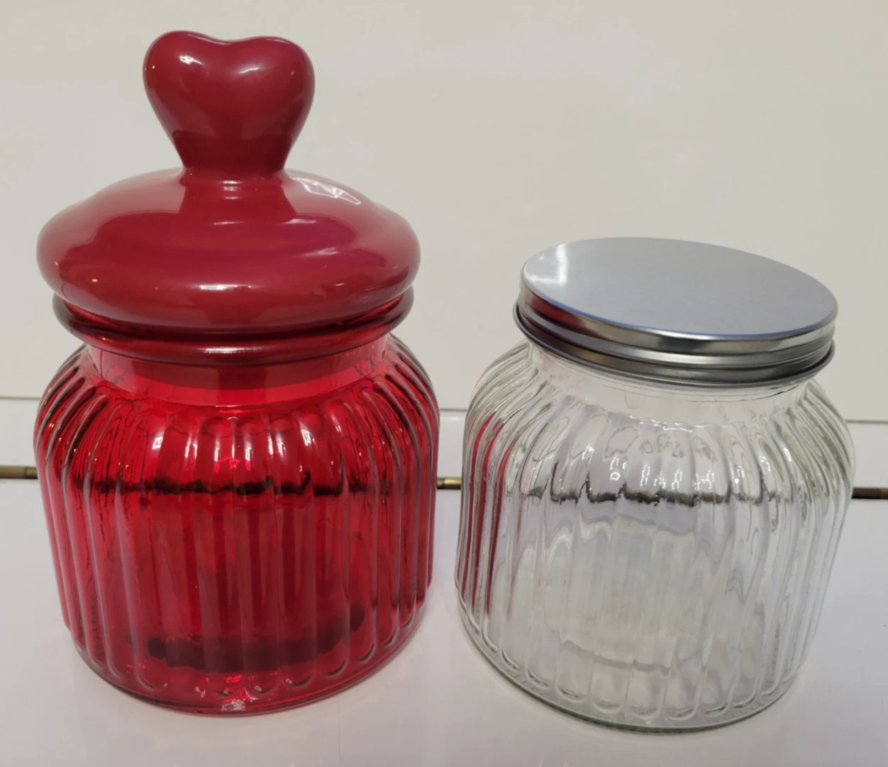 2 GLASS RIBBED CANDY COOKIE JARS RUBY RED AND CLEAR 4.5 INCHES HOLDS 24 OZS