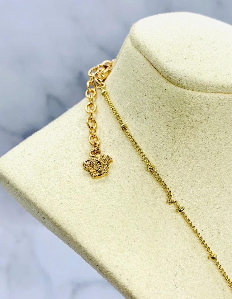 Auténtico collar con dije de concha tono dorado VERSACE - usado / LO5232 Foto 4 de 4