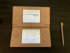 Nintendo DS Lite Pink Handheld Gaming System with stylus and games 