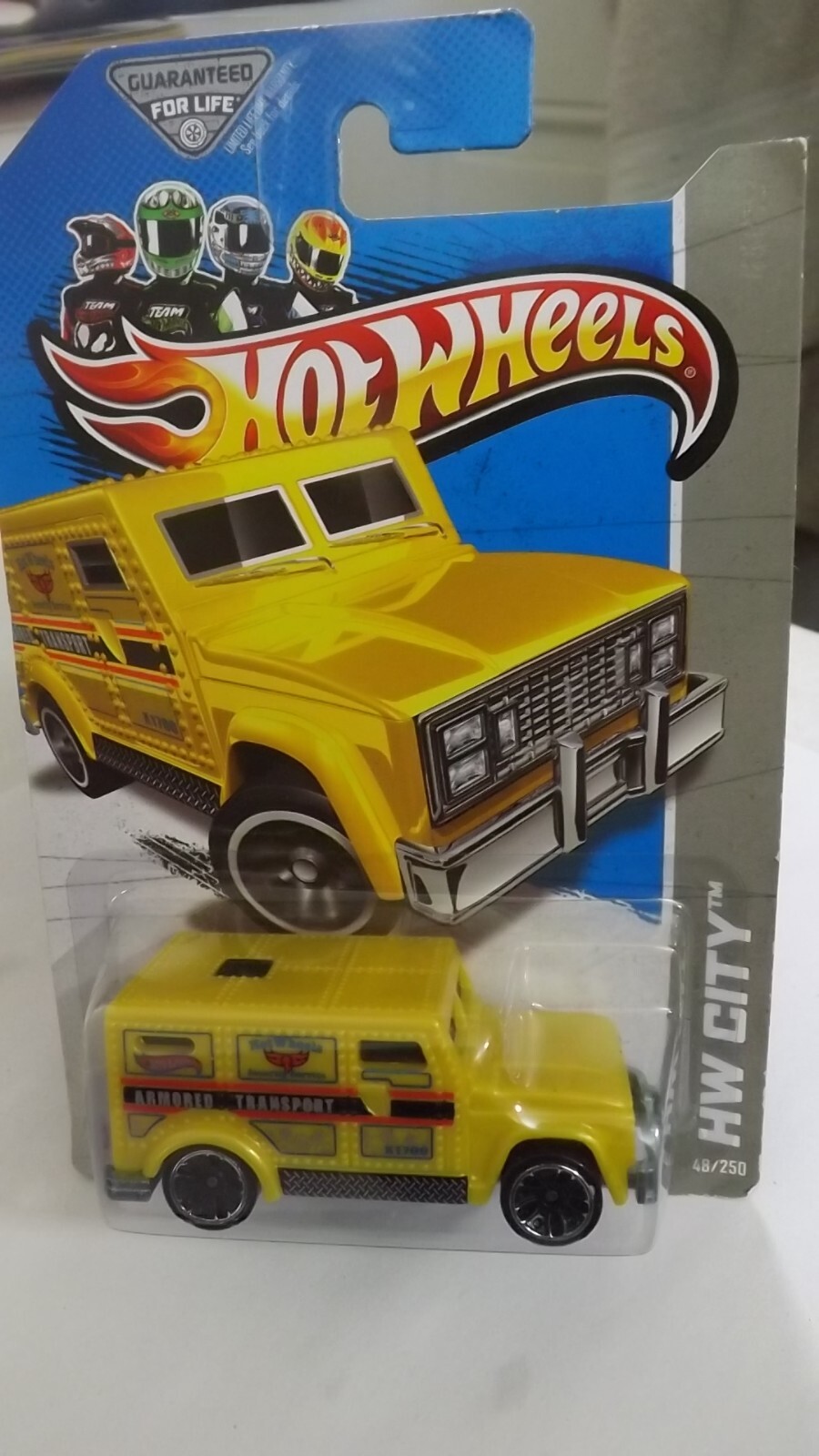 2013 Hotwheels Yellow Armored Truck HW City  1/64 Scale