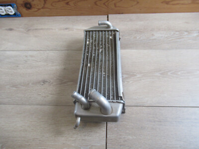 RM 125 SUZUKI *1997 RM 125 1997 RADIATOR LEFT LITTLE BENT STILL USABLE AS IS