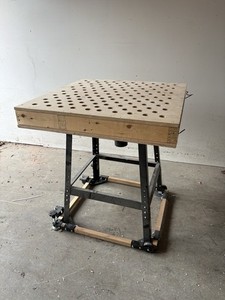 Custom wood working bench with tube for vacuum