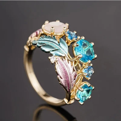 Damen Ring Verlobungsring Gold vergoldet Feder Blätter Ring farbige Steine - Bild 1 von 4