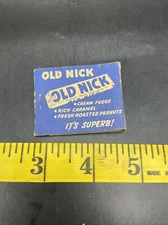 OLD NICK CANDY BAR MATCHBOOK MATCHCOVER: SCHUTTER CANDY CHICAGO, ILLINOIS