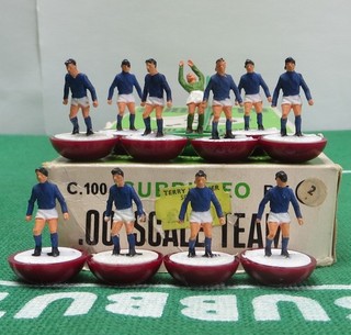 SUBBUTEO HW TEAM REF 2 COWDENBEATH ON CLARET BASES IN ORIGINAL NUMBERED BOX.