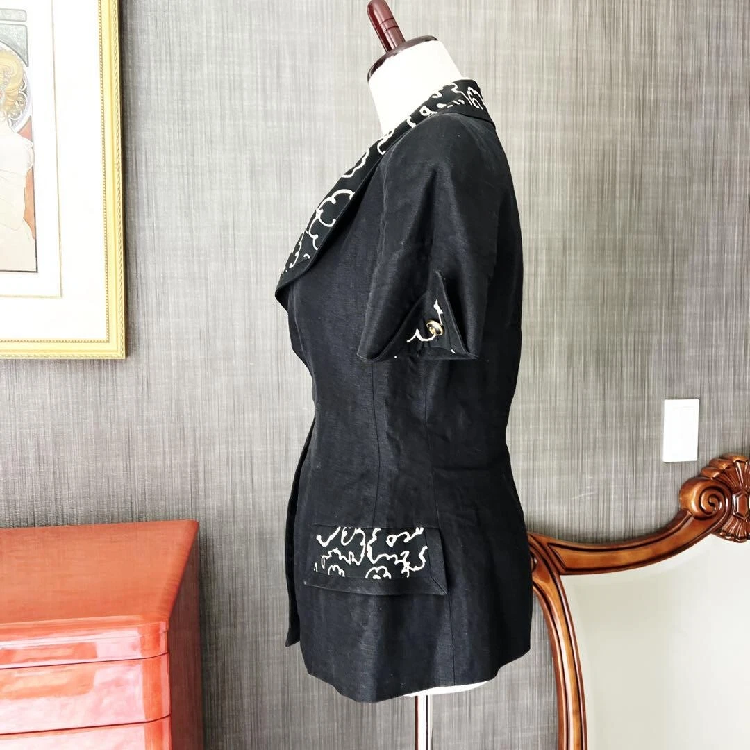 Giacca CHANEL Coco Mark bottoni manica corta nera estiva donna