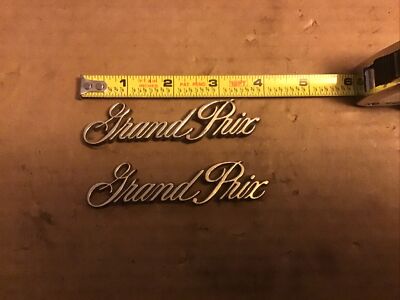 1970 s Grand Prix Gold Emblems OEM 