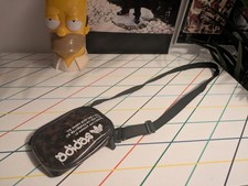 Adidas leopard animal print multi way cross body bag graffiti style font