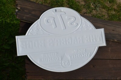 STP The Racer's Edge Embossed Tin Metal Sign - Motor Oil Treatment