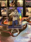 2025 Panini PhotoGenic Football Blue Greg Rousseau #2