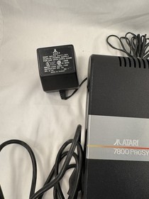 Atari 7800 Pro System w/ Power Supply & Two Controllers. Powers Up But Untested!