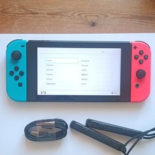 Nintendo Switch Console Handheld System, Neon Blue/Red Joy-Con, USB-C Cable