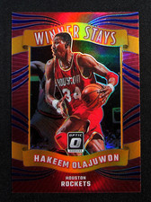 2023-24 Panini Donruss Optic - Winner Stays Hakeem Olajuwon #12 Purple Prizm