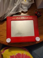 Etch-A-Sketch Spin Master Classic. Used. Works well! See photos.