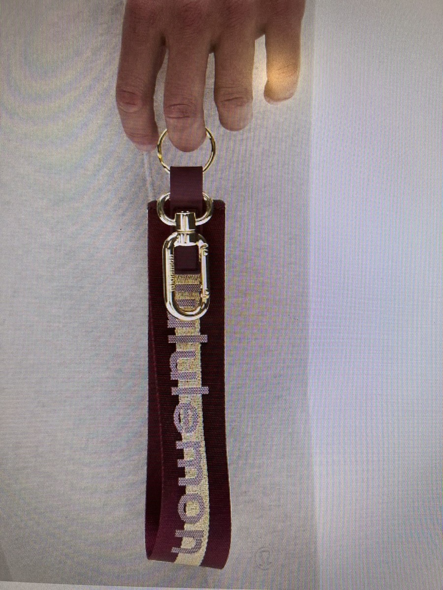 Lululemon Never Lost Keychain NWT Deep Luxe/Gold Never Lost Keychain in Deep Luxe/Gold/Bone | Mercari main image 4