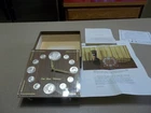 Our Silver Heritage Numismatic Clock 12 uncirculated silver coins Morgan dollar