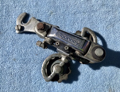 Deragliatore posteriore vintage Shimano Tourney RD-TY10 attacco asse 5 velocità argento 1990