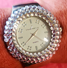 Vanova Women’s Dress Quartz Watch Silver Dial Gem Bezel Silver Bangle Bracelet