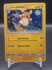 Pokemon Alolan Raichu SM65 Black Star Promo Cosmos Holo NM