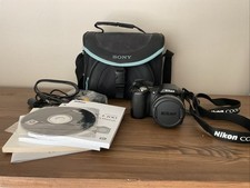 Nikon Coolpix Nikon L100 15x Wide Optical Zoom w/manuals, SD Card, Case- Tested