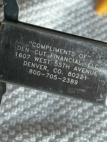 Complimentary Gadget Clip Den-Cut Financial, LLC