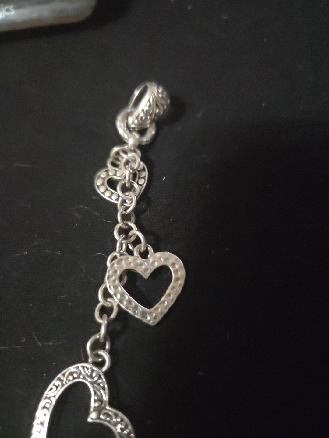 Sarda Artisan of Bali Sterling Silver Hanging Hearts Pendant