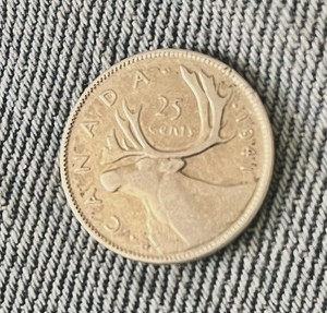 1941 Canada 25 Cents 80% silver and 20% copper Very Good To Fine Circulated