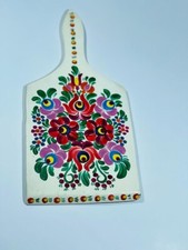 Wooden cutting board decorated with hand painted floral art Beautiful folk art
