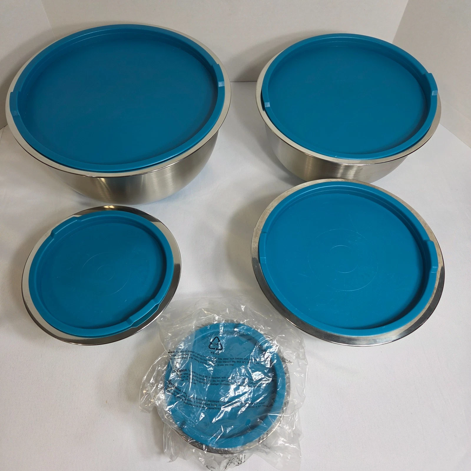 Tramontina Stainless Steel Measured Mixing Bowls w/ Teal Lids Set of 5
Opens in a new window or tab