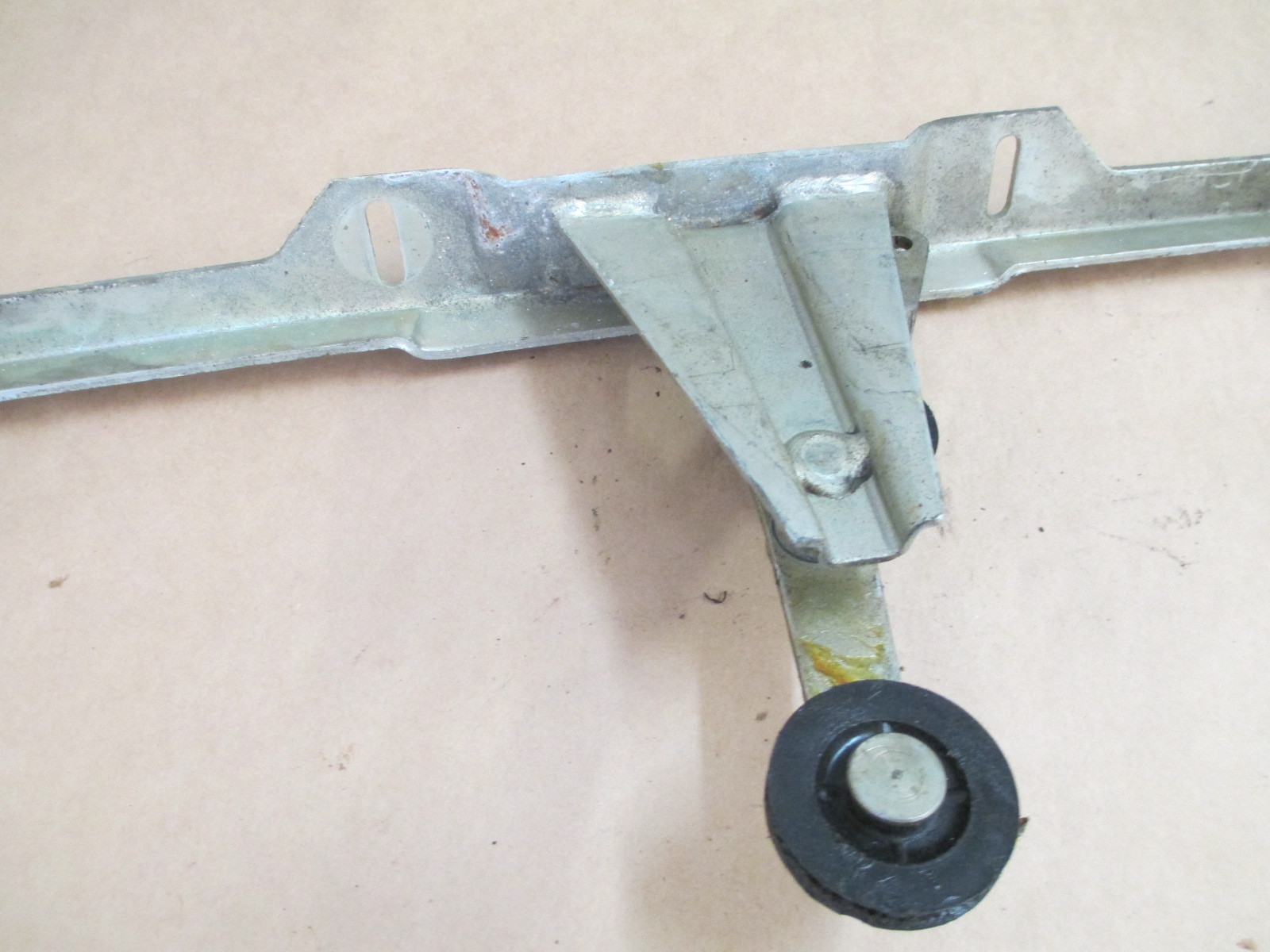Ferrari Testarossa - LH Lower Door Window / Glass Lift Bracket # 61510300