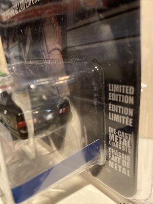 GREENLIGHT 1:64 GREEN MACHINE CHASE 1986 FORD TAURUS LX ROBOCOP