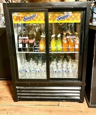 True GDM-33CPT-54-HC-LD 40" Pass-Thru Glass Door Commercial Refrigerator